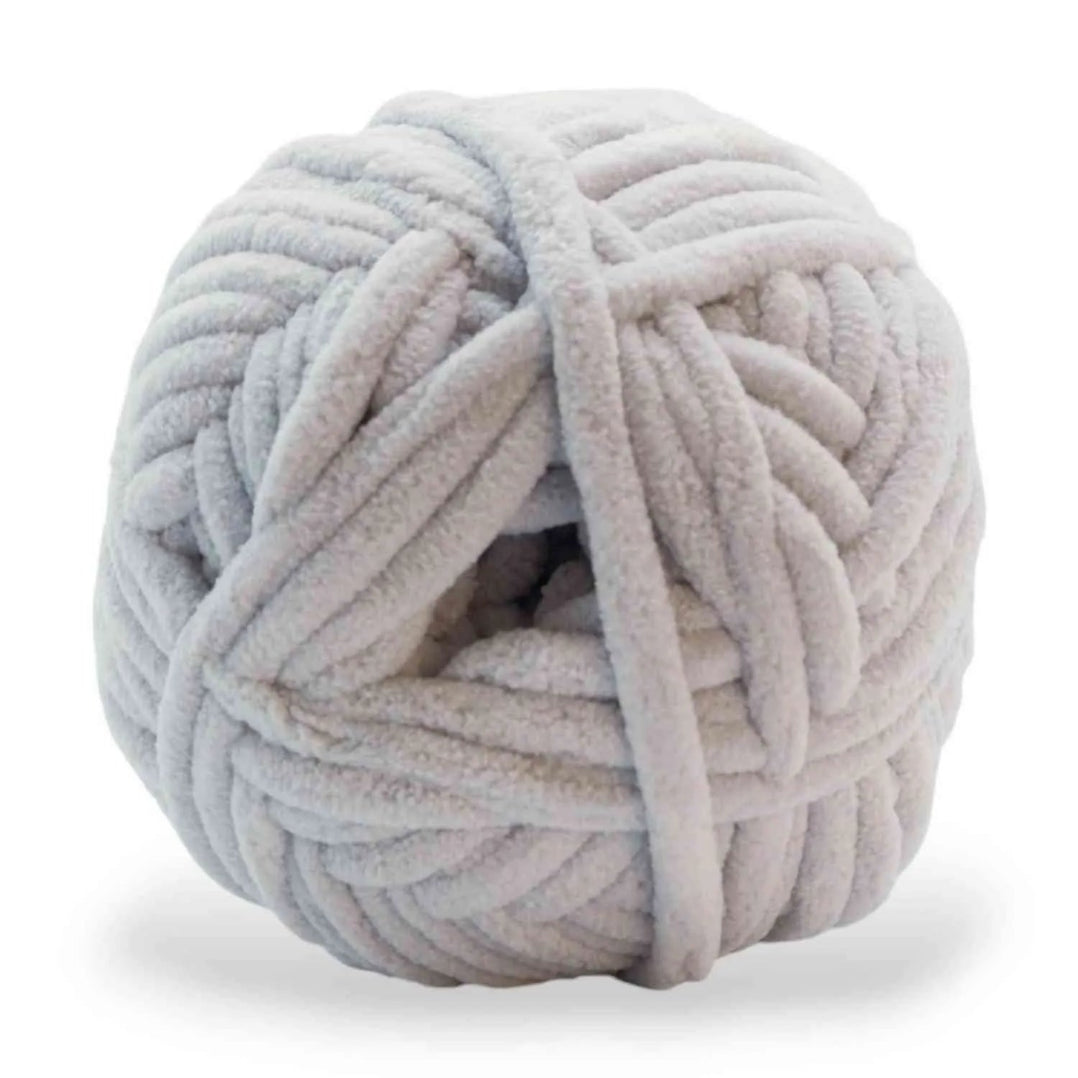 Large ball of gray yarn on a white background