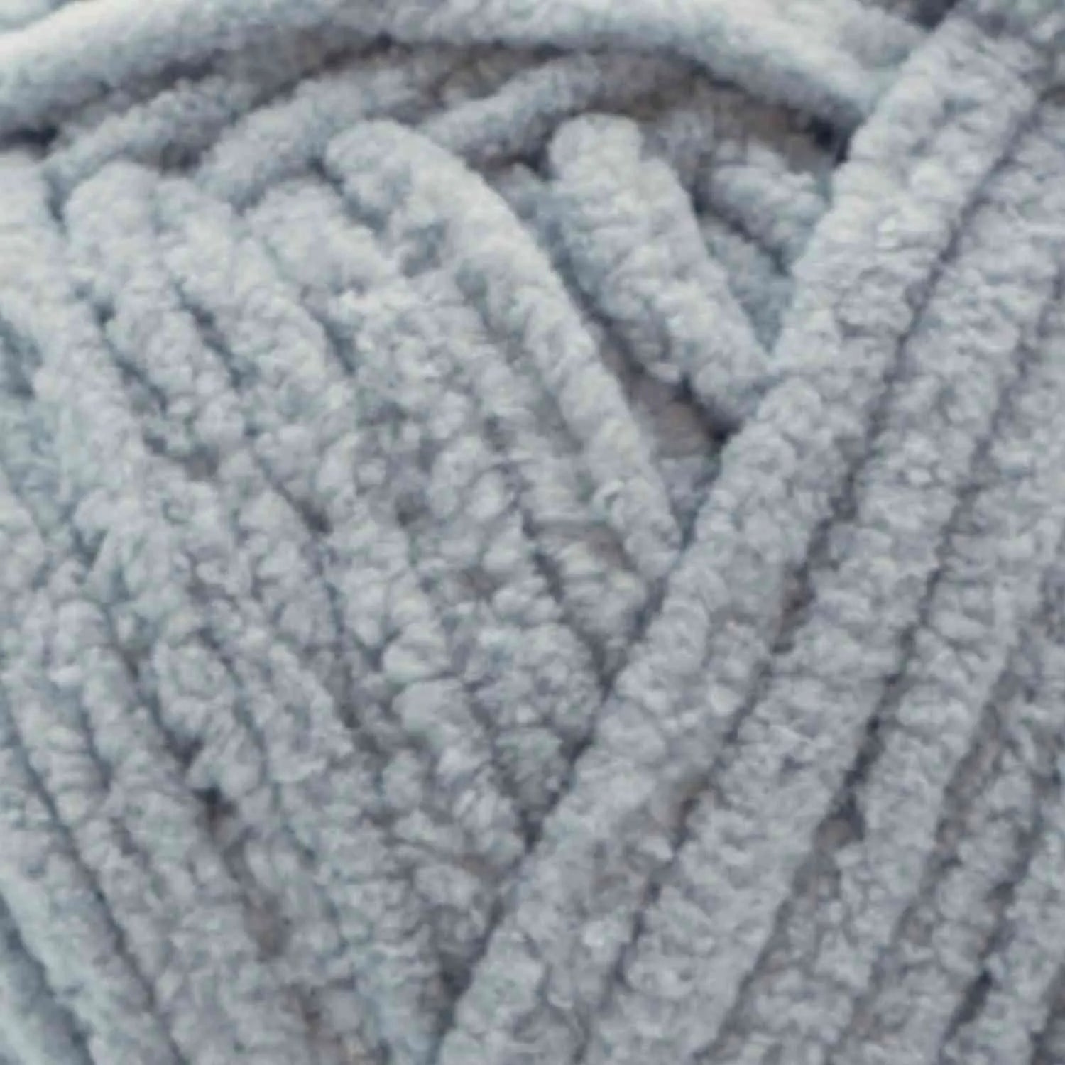 Close-up of a ball of light blue yarn