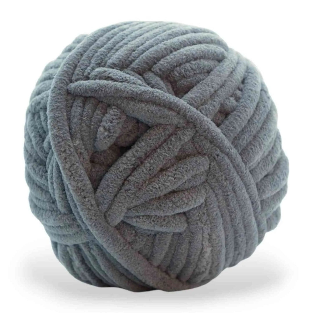 Gray skein of yarn on a white background