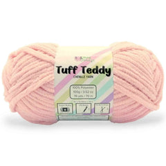 Pink skein of Tuff Teddy yarn with a label on a white background