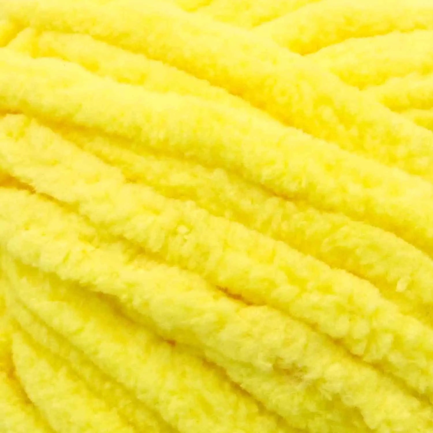 Close-up of bright yellow yarn