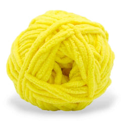 Yellow ball of yarn on a white background