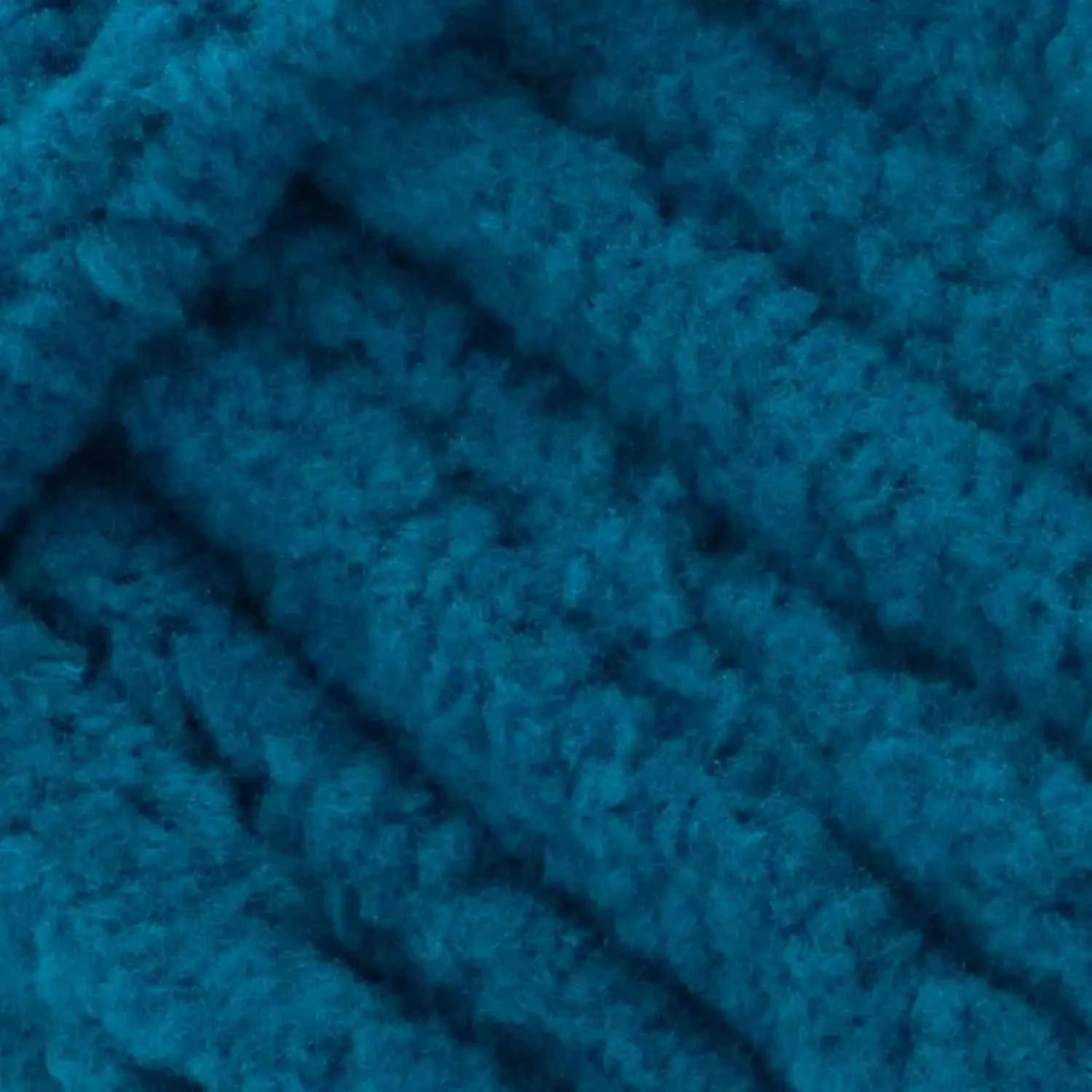 Close-up of blue textured yarn