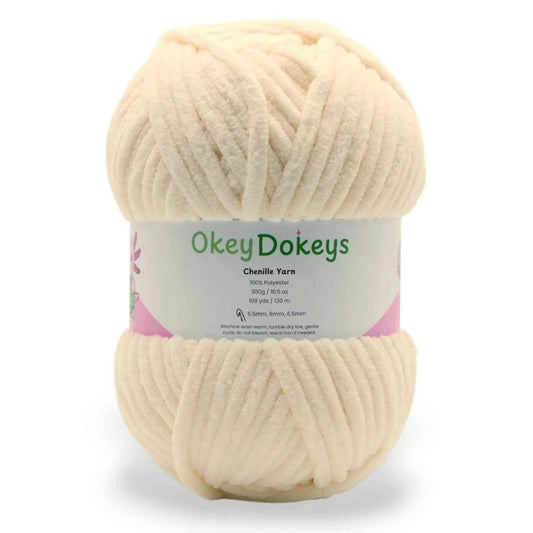 Cream-colored skein of yarn with a 'Okey Dokeys' label on a white background