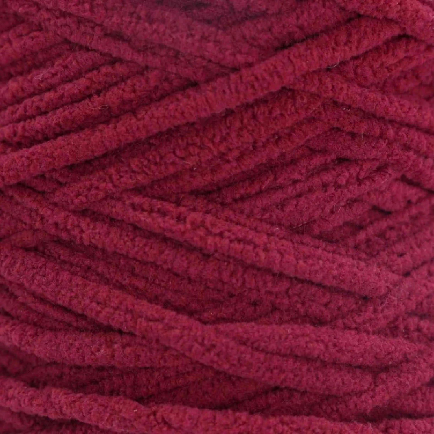 Close-up of a ball of red yarn