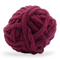 Maroon skein of yarn on a white background