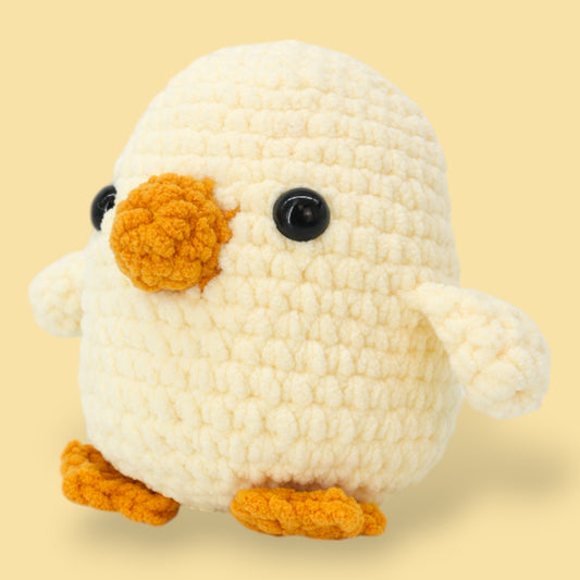 a image of a cute large crochet kit of a crocheted baby chicken or chick